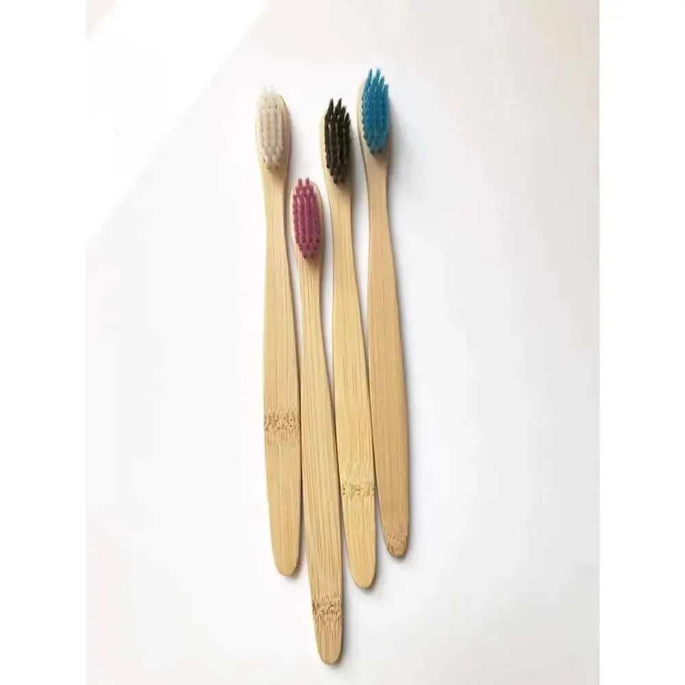 Bamboo toothbrush with infused soft bamboo charcoal bristles and bamboo containers. BPA Free