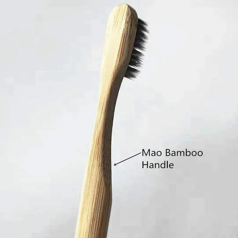 Bamboo toothbrush with infused soft bamboo charcoal bristles and bamboo containers. BPA Free